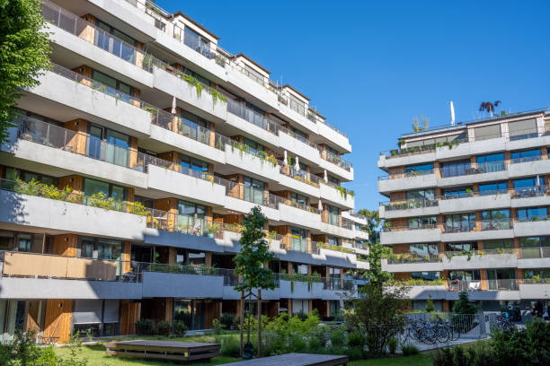 istock New grey apartment houses on a sunny day 1414566461