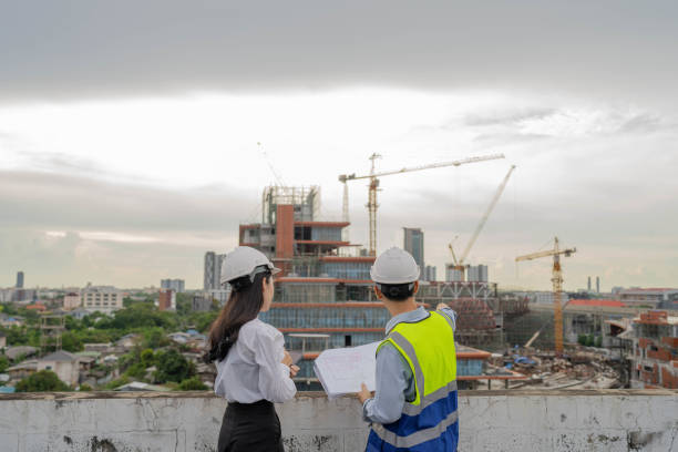 istock The engineering team is reviewing the performance at the construction site. 1414568312