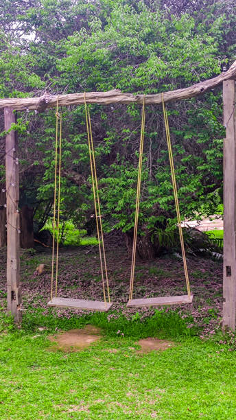 istock Wooden swings in the park 1414576428
