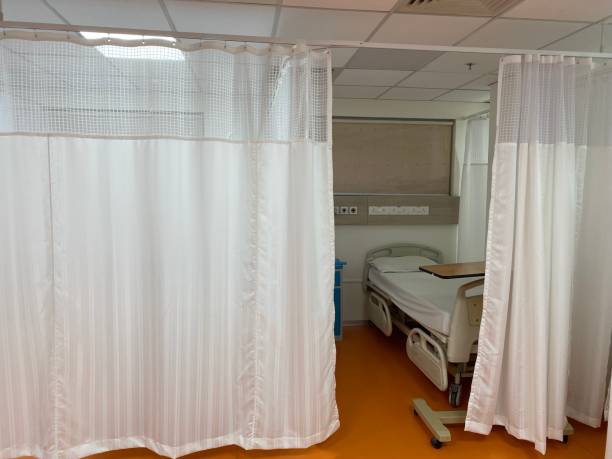 istock Patient bed and room in hospital 1414577844