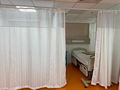 Patient bed and room in hospital