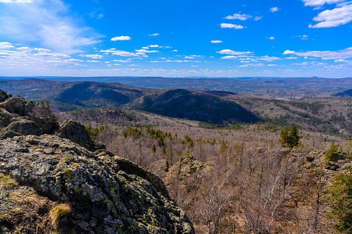 A view along the Appalachian trail in the Mahoosuc Range in Maine, a rock cairn marking the trail.