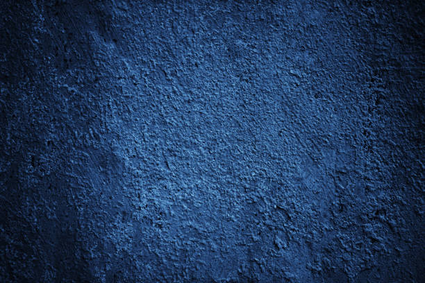istock Dark blue texture. Toned rough wall surface. Background for design. Close-up. 1414584652