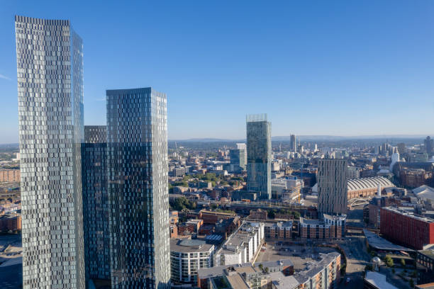 istock Manchester City Centre Drone Aerial View Above Building Work Skyline Construction Blue Sky Summer Beetham Tower Deansgate Square 2022 1414588188