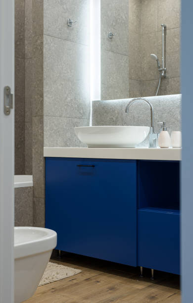 istock Modern bowl-shaped washbasin with chrome water mixer 1414588189