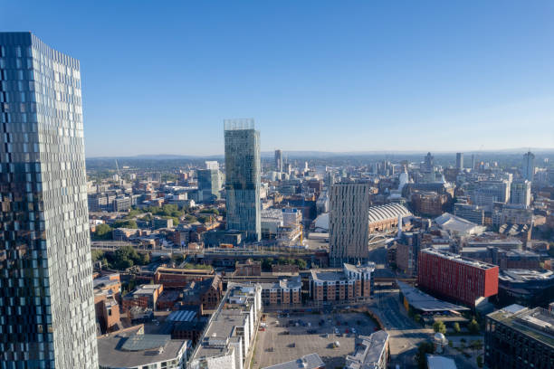 istock Manchester City Centre Drone Aerial View Above Building Work Skyline Construction Blue Sky Summer Beetham Tower Deansgate Square 2022 1414588205