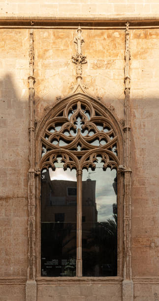 Palma de Mallorca, Spain. Window detail in the Sa Llotja dels Mercaders or Lonja de los Mercaderes (Merchant Market), a Gothic building by Guillem Sagrera in the 15th Century