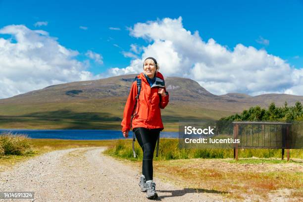 Wilderness Walking In Scottish Highlands Stock Photo - Download Image Now - Women, One Woman Only, Hiking