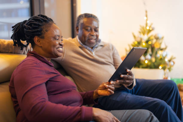 istock Grandparents having video call 1414593260