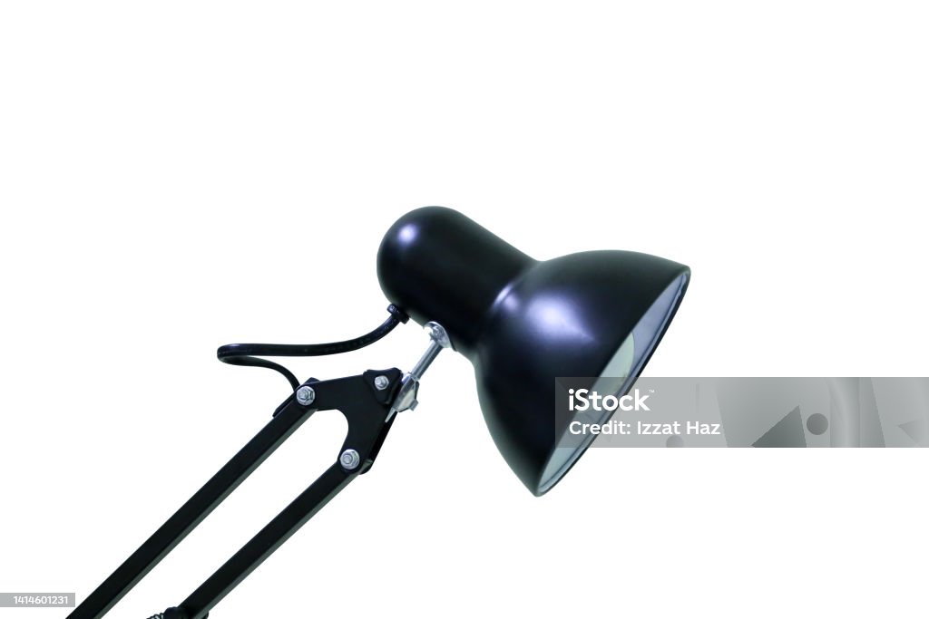 Table Lamp Black table lamp with small bulb on the table and shoot in white background Black Color Stock Photo