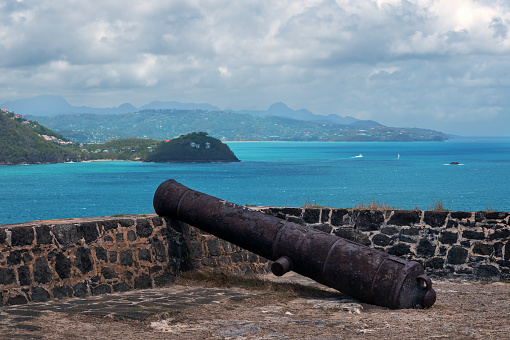 A historic cannon on top of Fort Rodney on Pigeon Island in Saint Lucia.