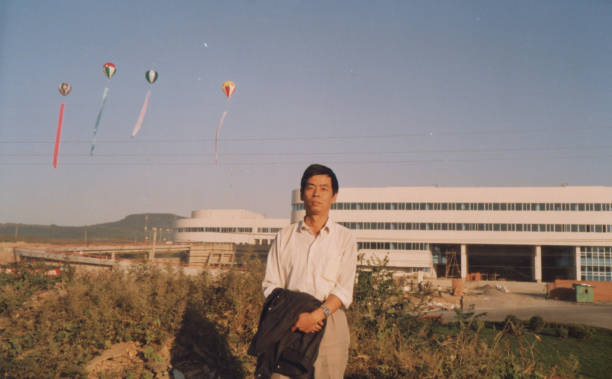 istock 1990s Chinese Men Real Life Old Photo 1414606256