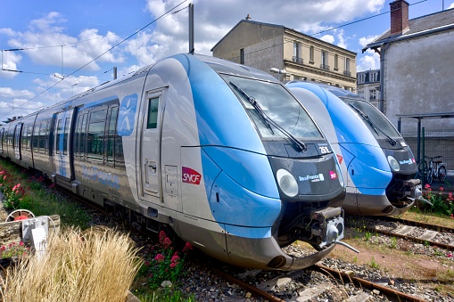 Versailles, France - May 28, 2022: Two trains at Versailles Rive Droite railway station