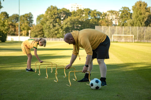 istock Soccer father and daughter preparing a coaching session 1414608325