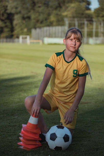 istock Soccer playing young girl preparing a coaching session 1414608498