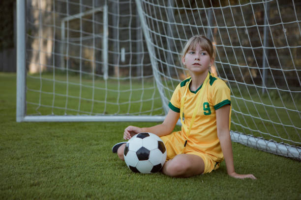 istock Soccer playing young girl preparing a coaching session 1414608525