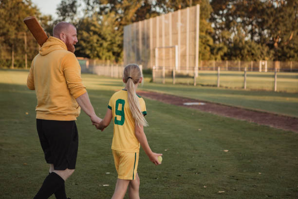 istock Soccer father and daughter resting during a coaching session 1414610734