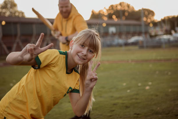 istock Cricket father and daughter working hard during a coaching session 1414610888