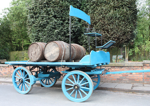 A Vintage Horse Drawn Brewery Delivery Cart.