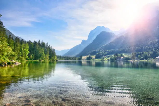 Hintersee Lake (Ramsauer Ache) below the steep walls of the Reiteralm and Hochkalter are among the most picturesque place in the Bavarian Alps, Germany