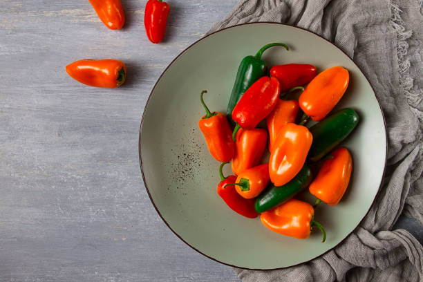 istock Mini sweet pepper, set, colored peppers, top view, no people, assortment, 1414615799
