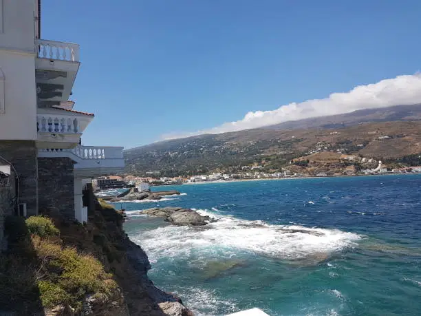 andros island andros city in greece sea and lighthouse