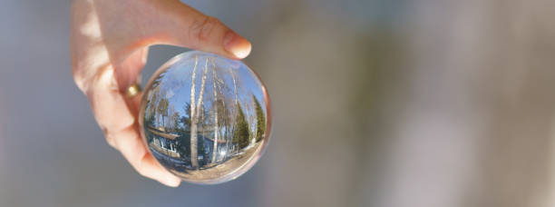 istock Nature inside the beautiful clear crystal ball. 1414617885