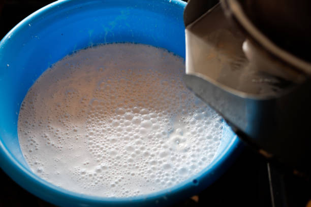 istock Coconut Milk Been Extract From The Machine 1414622491