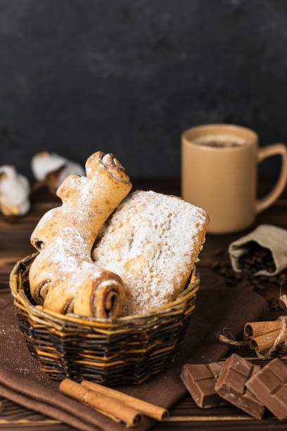 istock a cup of coffee with coffee beans on the table 1414631695