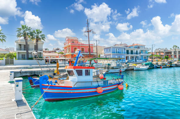 Landscape with fishing boats in port of Lixouri town, Kefalonia, Greece Landscape with fishing boats in port of Lixouri town, Kefalonia island, Greece lixouri stock pictures, royalty-free photos & images