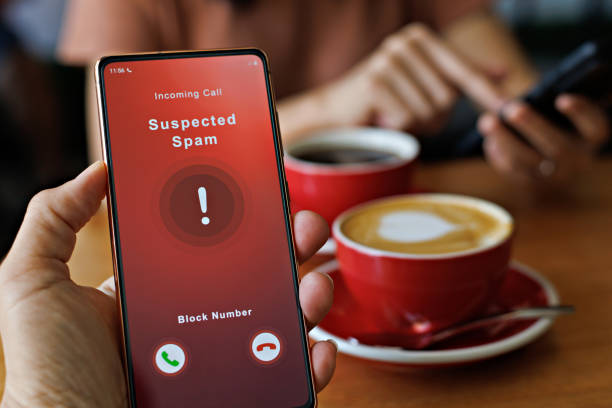 istock Person receiving suspected spam call on smartphone from an unknown caller 1414633164