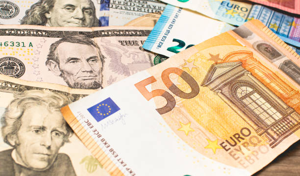 united states dollar banknotes and european union euro banknotes. finance, economy, international business, foreign exchange and travel budget concepts. - currency exchange currency european union currency dollar imagens e fotografias de stock