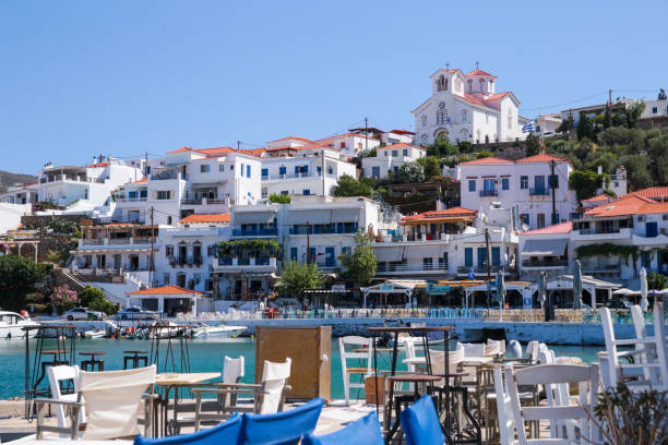 mpatsi or batsi city in andros island greece mpatsi or batsi city in andros island greece, greek tourist resort in aegean sea andros island stock pictures, royalty-free photos & images