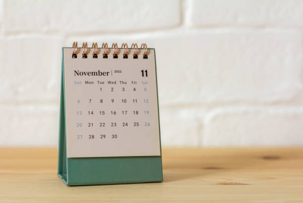 istock Desktop calendar for November 2022 on the table. 1414640398