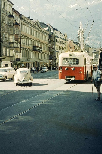 Innsbruck, Austria, August 5, 1965 - Historic photo from 1965 of an electric bus / trolleybus / Obus in the Maria-Theresien-Straße of Innsbruck