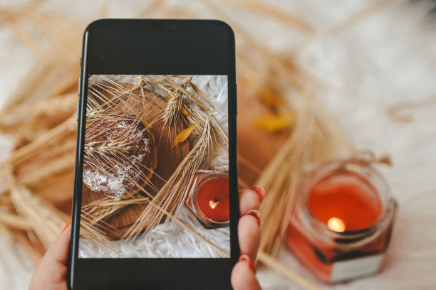 istock Taking photos of table with fresh baked bread 1414642614