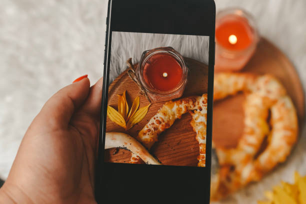 istock Taking photos of table with fresh baked bread 1414643823