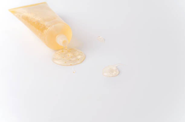 istock Cosmetics face care gel with gold additives on a white background 1414647836