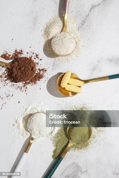 Different Types Of Dietary Supplements Forhealth And Beauty Collagen Vitamins Biotin Protein In Pills And Powder Form Stock Photo - Download Image Now