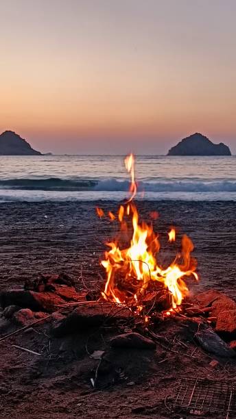 istock Camfire by the sea 01 1414660539