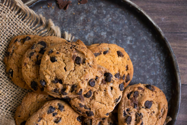 istock Cookies with chocolate on a dark background 1414661676