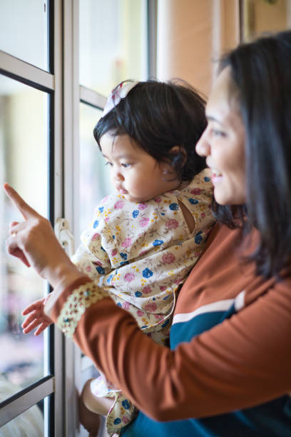 istock Mother with her baby daughter 1414668418