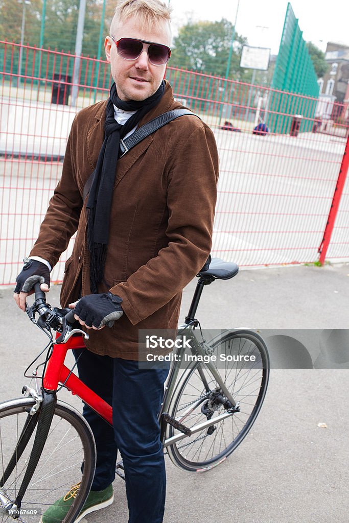 Cyclist in urban setting  40-44 Years Stock Photo