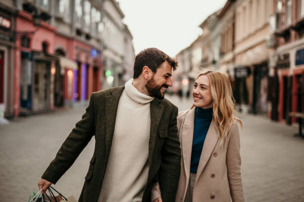 istock Traveling and shopping couple 1414676131