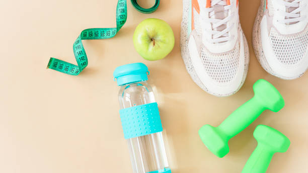 istock Fitness equipment on a dark background with copy space 1414679738