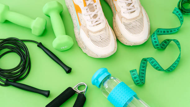 istock Fitness equipment on a dark background with copy space 1414679797