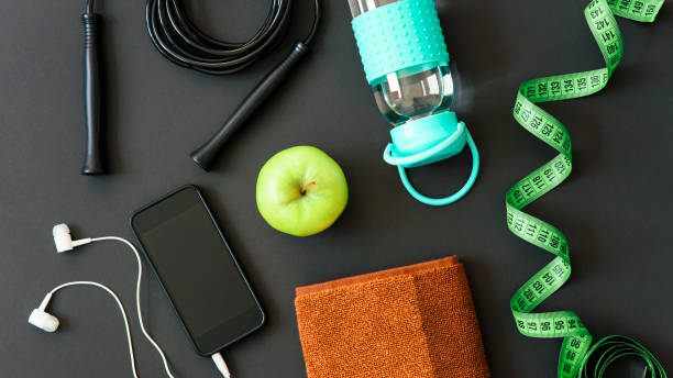 istock Fitness equipment on a dark background with copy space 1414679809