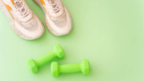 istock Fitness equipment on a dark background with copy space 1414679810