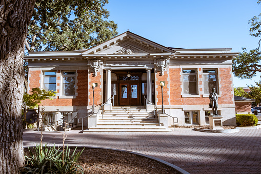 Paso Robles, CA - July 15, 2022: Public library in the middle of the city park.