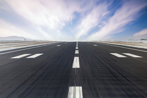 A view down the full length of a runway at Gatwick Airport, London, before take off.